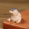 Nordic resin crocodile tea pet ornament in sitting pose for office and home decor - Crocodile Financial