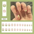 Set di 24 unghie finte riutilizzabili rosa con punte French verdi e motivi a onde bianche - Nastro Verde (R423)