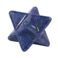 Detail of blue lapis stone Merkaba star pendant with natural gold flecks on white surface - Lapis Lazuli
