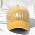 Front view of yellow washed cotton baseball cap with artistic FOCUS letter embroidery - One Size / Yellow