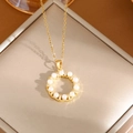 Elegant gold titanium steel necklace featuring a round pendant with white pearls and zircons - 6264 Gold Circle Pearl