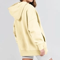 Detail of light yellow oversized hoodie with dropped shoulders and a spacious pocket - S / Light Yellow