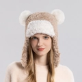 Winter plush earflap hat in light brown and white with decorative faux fur pom-poms - Khaki