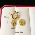 Golden dolphin brooch with transparent gems and dimensions of 3.0cm by 1.6cm - Flexible Dolphin (C205)