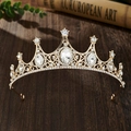 Detail of vintage gold crown for girls with clear rhinestones on dark wood background - Gold White Zirconia