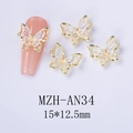 Macro view of 3D laser iridescent butterfly nail charms with gold alloy frame MZH-AN34 - Iridescent Aurora Gold Style (AN34)