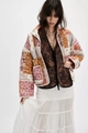 Detail of colorful patchwork quilted jacket with leopard vest and white tulle layered skirt - Mixed Floral Print