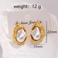 Detailed view of 18k gold plated wrinkled lava earrings with baroque pearls on jewelry card - Irregular Lava Pearl Studs (Style 1)