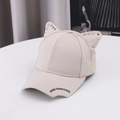 Beige cat ear baseball cap with silver rivets and embroidered lettering on the brim - One Size / White