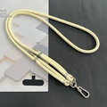 Detail of 8mm thick woven yellow crossbody phone lanyard with silver metal hook and tab - 8mm Dual Adjustable / Beige