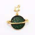 Gold plated Saturn planet pendant with green zircon stones and a dangling star charm - Green Planet