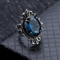 Anello reale vintage con grande pietra ovale blu intenso e design floreale in argento - US 7 / Blu