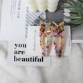 Set of two cat-shaped acetate hair clips with floral pattern on white display card - 2 Pcs/Set / Rainbow