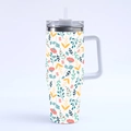 Close-up of 40oz stainless steel tumbler with vibrant floral leaf patterns and straw - Style 7-Red Yellow Floral