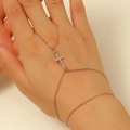 Sparkling rhinestone cross slave bracelet in rose gold finish on woman's hand - 25kc Gold K-555