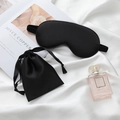 Set of black faux silk sleep mask and matching drawstring storage pouch on satin background - 2-Piece Set (Eye Mask + Bag) / Black