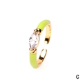Adjustable golden ring featuring light green enamel and marquise-cut clear gemstone - Marquise / Green