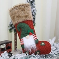 Red knitted Christmas stocking with green hat gnome doll and wooden button accents - Red 3D Gnome / Red