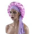 Lavender satin hair bonnet with wide ribbons for hair protection shown on mannequin head - Medium / Light Purple