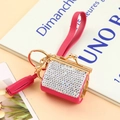 Detailed view of pink rhinestone coin purse keychain with golden frame and tassel - Rose Red Full Rhinestone