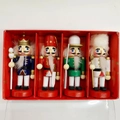 Set of four 13cm wooden nutcracker soldiers with glitter and feather accents in a red box - Multi-color 10CM (4PCS Set)