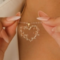 Rose gold heart pendant necklace with intricate rose and vine relief design - KC Gold Embossed Rose Heart (4879)