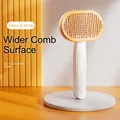 Self-cleaning pet brush in yellow and white with wide needle head for hair grooming - Yellow/White