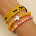 Close-up of pink and yellow WWJD bracelet set with beads and cross charm on wrist - Yellow (DZ-596)