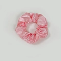 Pink satin scrunchie with soft pleated silk texture and elegant pearlescent finish - Satin 19 (Soft Pink)