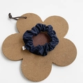 Dark blue fabric scrunchie with natural texture on a floral cork coaster - Small / Navy Blue