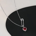 Detail of safety pin necklace with a red heart gemstone and micro-pave crystals - Silver Red