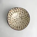 Handmade coconut shell bowl featuring iridescent pearl shell inlay in flower pattern - Camel Water Drop Style