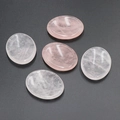 Polished natural rose quartz and white crystal oval thumb stones for facial massage - Rose Quartz