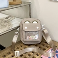 Beige bear-shaped crossbody bag with transparent window and colorful badges - Khaki