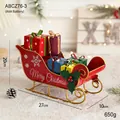 Décoration de traîneau de Noël rouge en métal avec flocons et boîtes cadeaux - Traîneau de Cadeaux Rouge