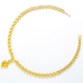 Macro detail of luxury heart necklace with yellow crystals and tennis chain links - Gold Yellow Zirconia Necklace