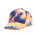 Detailed view of multi-color tie-dye baseball cap fabric with reinforced yellow stitching - Dark Blue Orange Tie-Dye
