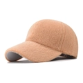 Close-up of camel faux rabbit fur texture on a warm winter baseball cap with curved brim - Khaki