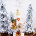 Detailed view of standing Santa Claus doll in gold and white tones among snowy trees - 5 Inch New Gold Print Style