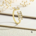 Detail of gold open ring with rectangular zircon stones on white paper background - Adjustable Open / White Stone Style (RG0628-G)