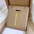 Golden titanium steel bar necklace with white shell inlay in a premium jewelry box - Long Bar MOP Pendant Gold (N129)