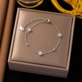 Detailed macro of silver stainless steel bracelet with roman numerals and crystals - Roman Dial Silver