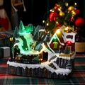 Detail of a Christmas music box with LED lights, mini train, and festive village scene - Double Rotating Kids Style