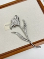 Close-up of silver tulip flower brooch with detailed metallic texture and elegant curves - Silver Flower Brooch XZ0008