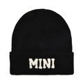Detail of black knitted beanie featuring soft white plush MINI lettering on the cuff - Black