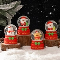 Christmas snow globes featuring Santa, Snowman, and Reindeer with red Merry Christmas bases - 2518# (lights + Snowflakes) / 45# (cardboard Box Packaging)