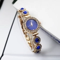 Elegant gold bracelet watch with blue dial and crystals for women in luxury style - Blue