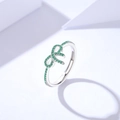 S925 sterling silver bow ring featuring green cubic zirconia stones in a silver finish - Adjustable Open / Green Zirconia