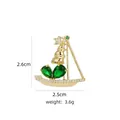 Elegant gold sailboat brooch with green teardrop gemstones and white crystals - B748 Green/Sailboat