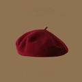 Detailed texture of burgundy wool beret with premium felt finish and rich color - One Size / Burgundy